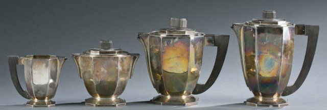 Sterling Art Deco tea & coffee set.: A French sterling Maison Bloch Eschwege (1921-1946) Art Deco tea & coffee service, after Puiforcat. Includes a tea pot, coffee pot, creamer, and sugar bowl. Largest (coffee) 8" x 4 1/4". and smallest