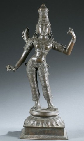 Bronze standing Shiva statue.: A bronze standing Shiva statue. Shiva in the form of Ardhanarisvara, wearing a tall crown, standing on lotus throne. 23 1/2"h x 13"w x 8"d.