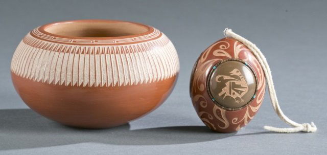 Marie Gonzales pot & Russell carved egg.: A group of two Native American cermaics. ++ A Marie Gonzales San Ildefonso redware pot. 1994. Having incised linear decoration at rim. Signed on bottom: "Marie Gonzales - Kailahi San Ildefonso Pueblo,
