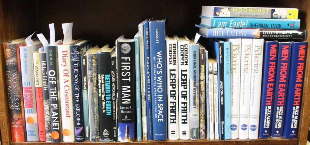 27 titles (34 vols, 10 sgd): Astronaut biographies: [Astronaut Biographies] 34 vols, 10 sgd. incl. one signed by David Scott and Alexei Leonov. Provenance: The Donald Boggs Collection of Space Books and Flown Objects. Sold as is, with all faults.