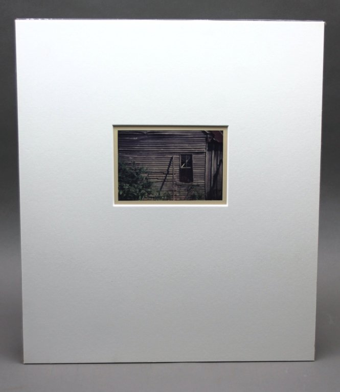CHRISTENBERRY, "Window, Hinds County, Mississippi": [Christenberry/Photograph Signed]Christenberry, William (US, 1936-). 1986 reprint of a 1979 photo titled and dated by Christenberry on bottom reverse, "Window, Hinds County, Mississippi, 1979. Printed