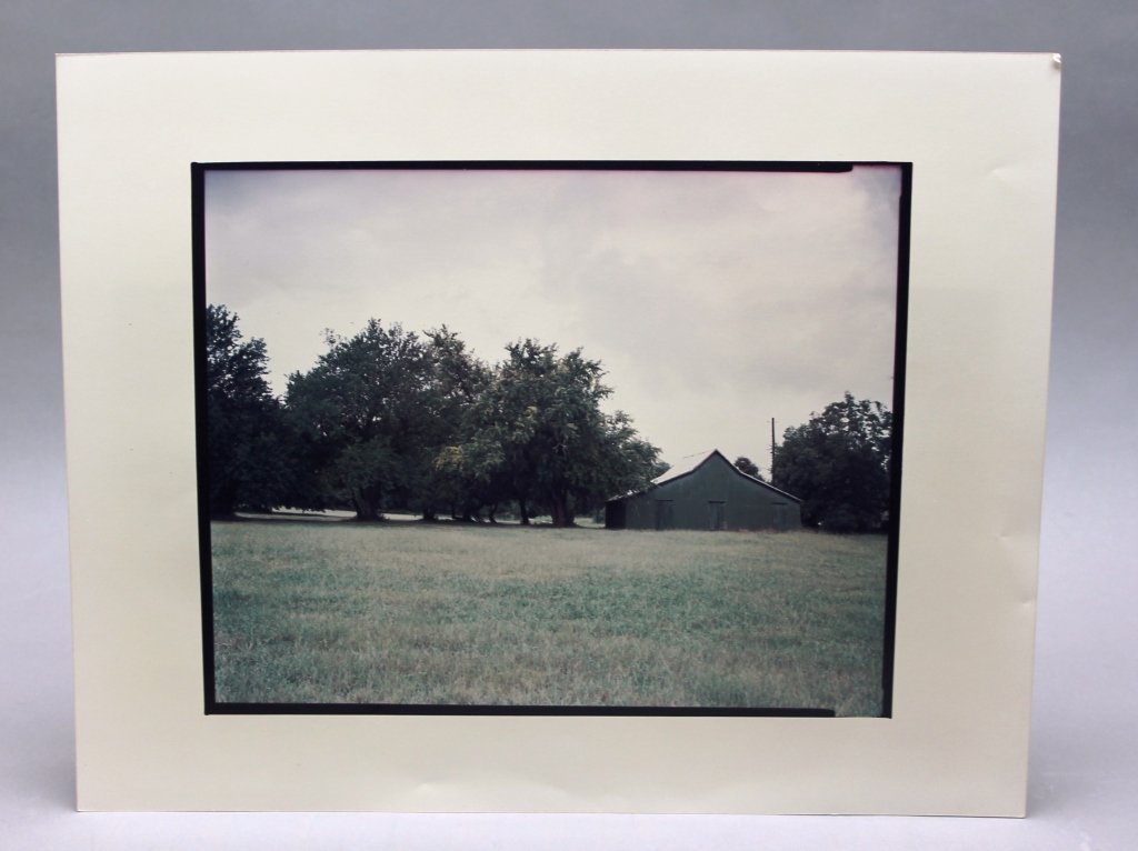 CHRISTENBERRY: "Green Warehouse, Newbern, AL": [Christenberry/Photograph Signed] Christenberry, William (US, 1936-). "Green Warehouse (Distant View), Newbern, Alabama, 1981." Titled and signed with initials (“C W”) at lower right corner of ver