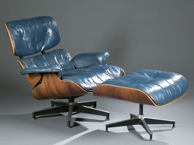 Eames rosewood 670 lounge chair with 671 ottoman.: An Eames rosewood 670 lounge chair with 671 ottoman. Designed for Herman Miller. 1960s. Brazilian rosewood veneer shell, blue leather upholstery, and enameled aluminum frame. Manufacturer's label on u