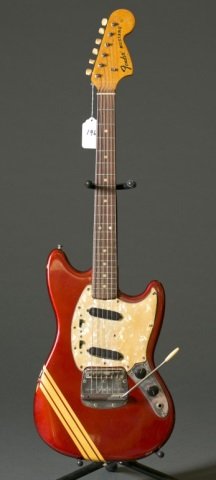 A Fender Mustang electric guitar with tremolo. Ser (1 of 2)