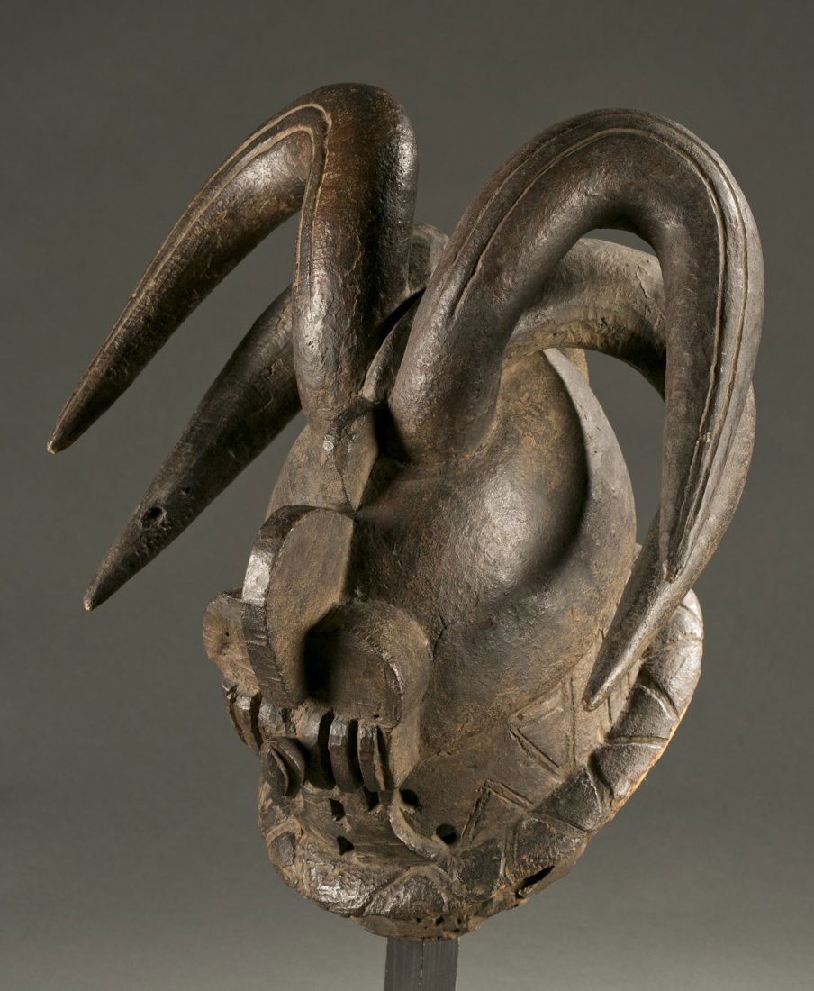 West African horned helmet mask, 20th century. (1 of 4)