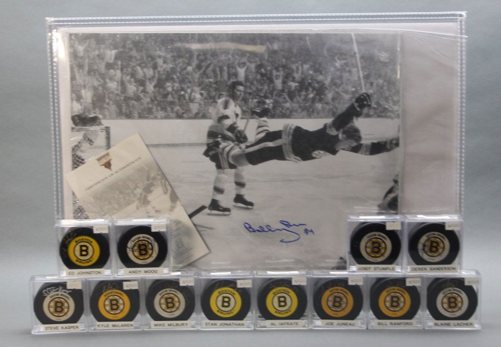 Sgd. Boston Bruin Bobby Orr photo & 12 sgd. pucks (1 of 1)