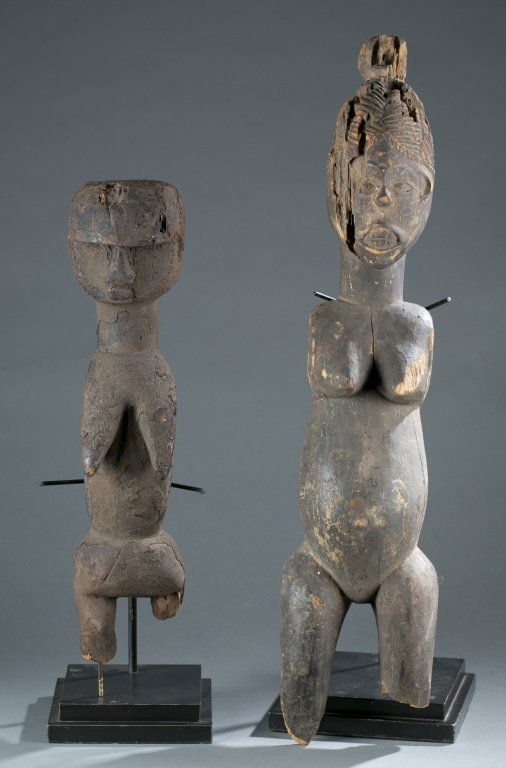 A wooden female figure. (1 of 10)