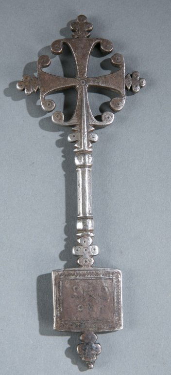 A metal handheld Coptic cross. (1 of 2)