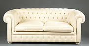 Renzo Frau Italian cream leather loveseat.: A Renzo Frau cream tufted leather loveseat retailed by Poltrano Frau. 27 1/2" x 68" x 32".