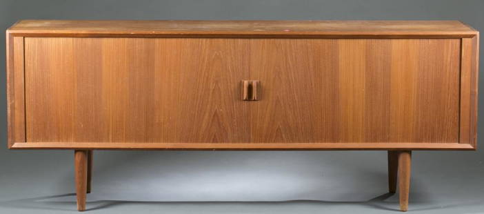 Faarup Mobelfabrik Danish teak sideboard/credenza: A Faarup Mobelfabrik Danish teak sideboard/ credenza. Svend Aage Larsen for Faarup Mobelfabrik, c.1960s. Two sliding tambour doors opening to drawers and storage space. Tapered legs. Povl Dinesen Dani