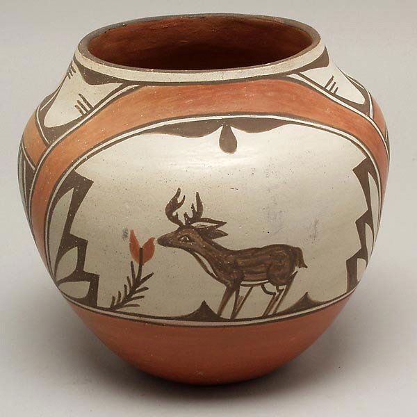 VINTAGE ZIA PUEBLO INDIAN POTTERY BOWL: ZIA POLYCHROME POTTERY BOWL. With two arching panels enclosing scene of a deer in a stylized landscape, thunderbird design between. Orangeware with brown, dark brown, and cream paints. Mid-20th centur