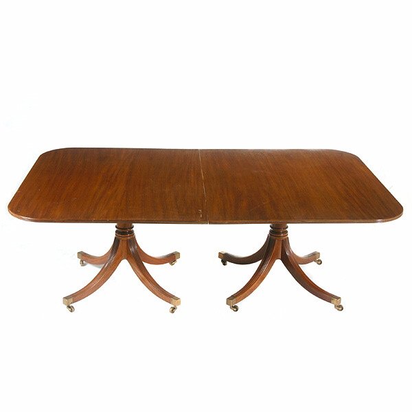 Regency Style Dining Table: Solid Mahogany Regency Style Dining Table 29 inches tall, 53 inches wide, 85 inches long without the leaf (leaf is 24 inches)