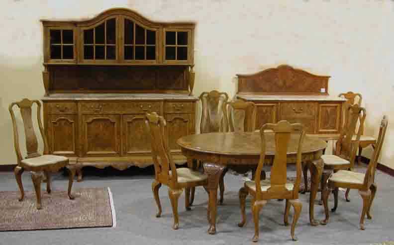 Queen Anne Style Dining Suite: Queen Anne style dining suite including buffet, server, table and eight chairs in burl walnut with light, floral marquetry back leg of server in need of repair
