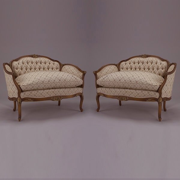 Pair of Settees: Pair of Louis XV Style Parcel Gilt Settees en Corbeille, Second Quarter 20th Century {Height of each 34 inches; width 4 feet depth 20 inches} {Good condition}