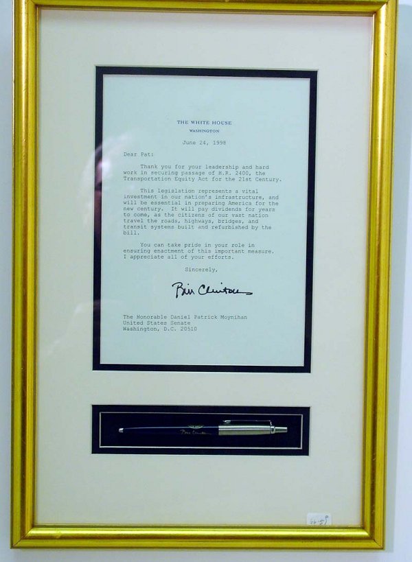 Bill Clinton Signing Pen: Bill Clinton Signing Pen. Given to Patrick Moynihan in appreciation for securing passage of the Transportation Equity Act, autographed "Bill Clinton". Dated June 24, 1998. Document 6" x 8 1/2" [sight]
