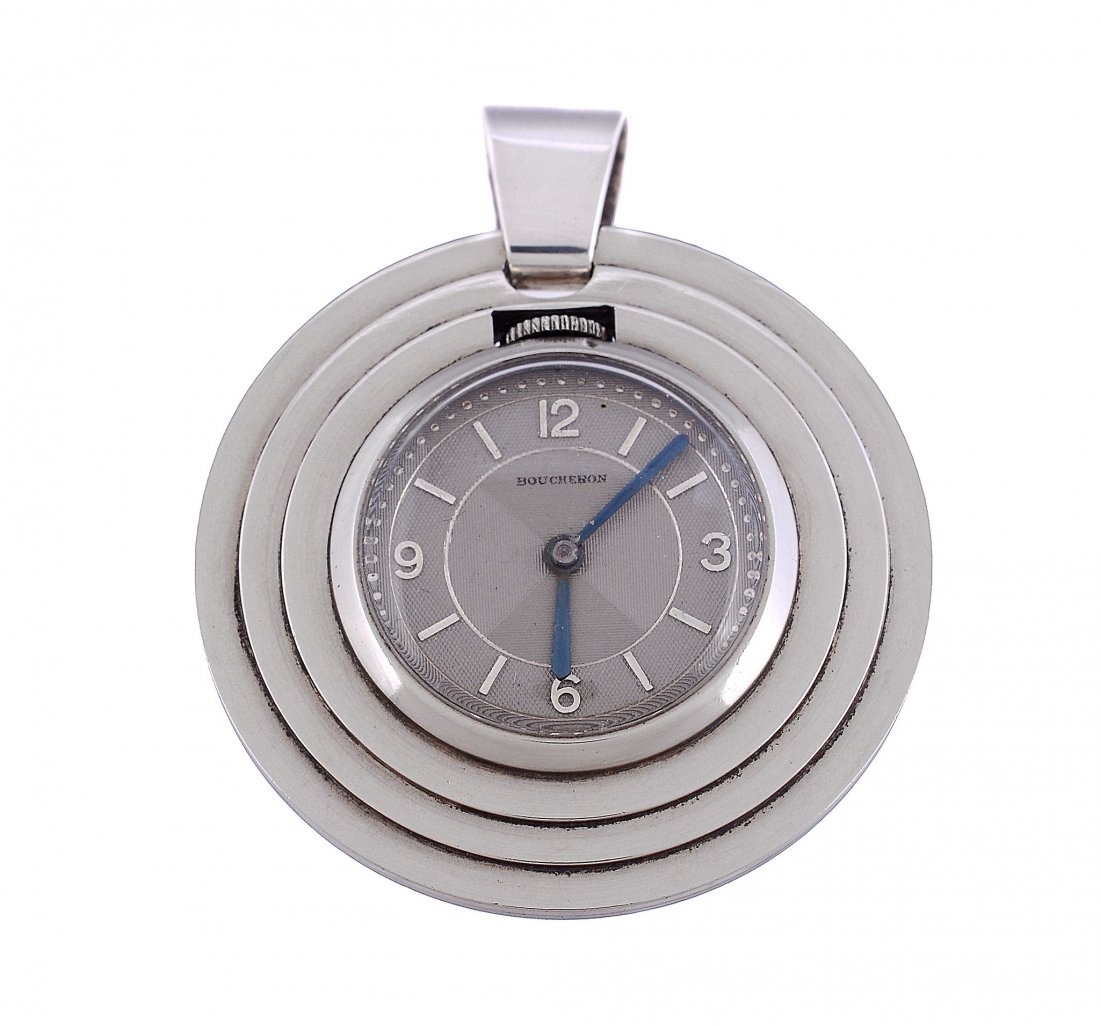 Boucheron, a silver coloured pendant watch, circa 1935: Boucheron, a silver coloured pendant watch, circa 1935, Swiss manual wind movement, 17 jewels, silvered engine turned dial, applied Arabic numerals and baton markers, blued steel sword hands, stepped