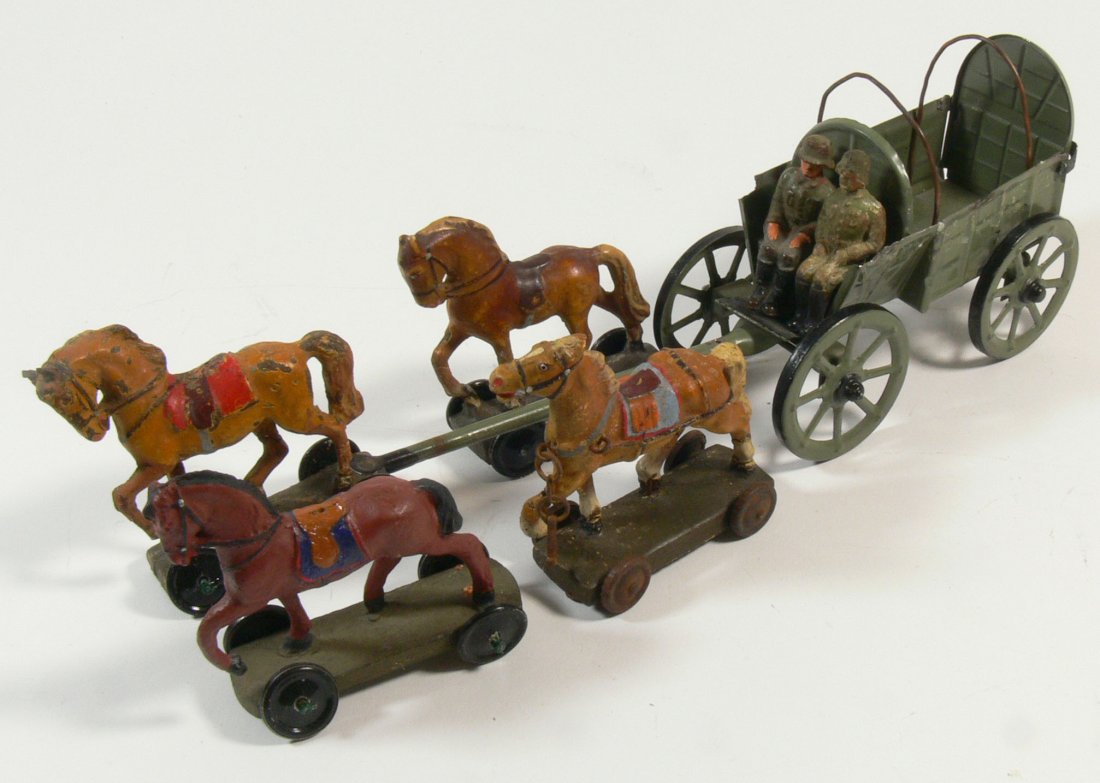 Lineol MilitÃ¤r - Kutsche, Blech, mit vier Pferden und: Lineol MilitÃ¤r - Kutsche, Blech, mit vier Pferden und zwei Soldaten. Masse handbemalt. Nicht komplett.