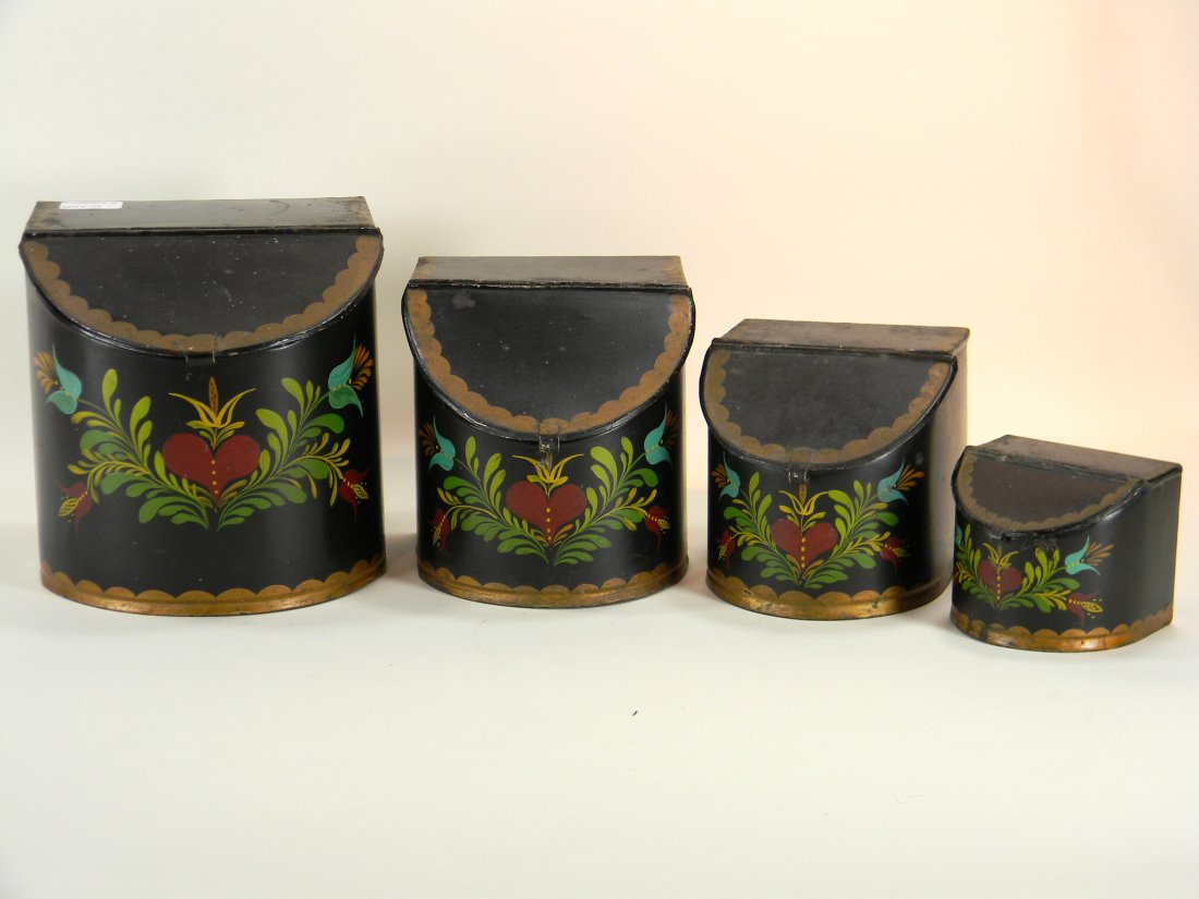 Set of 4 tole canisters.: Set of 4 tole canisters.