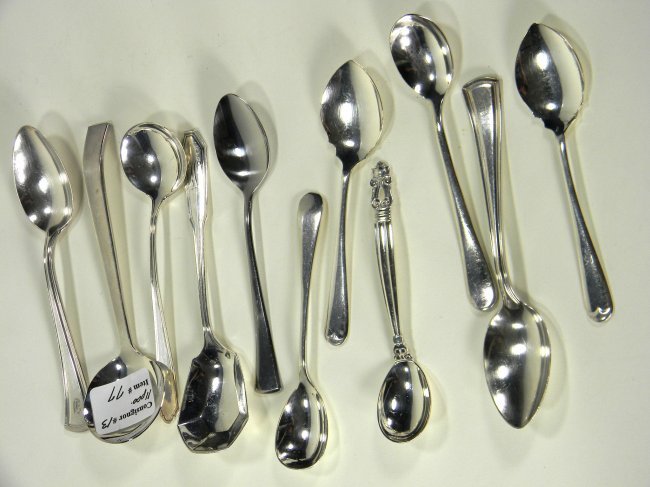 Mixed lot of silver spoons.: Mixed lot of sterling silver and silver-plate spoons. 3 sterling. 1 George Jensen.