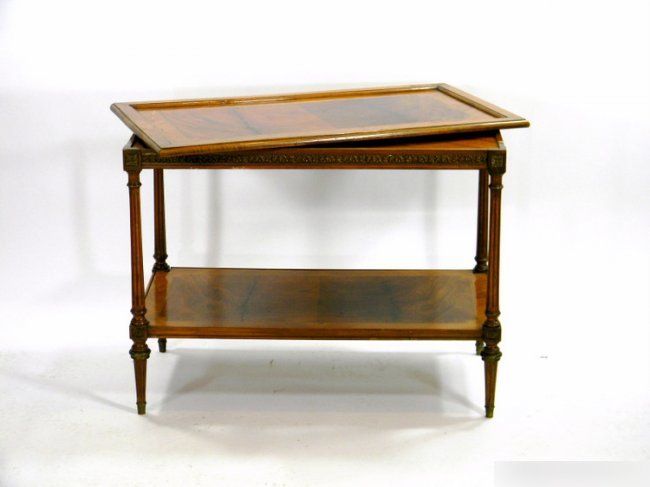 FRENCH TRAY TABLE: French mid-20th century two-tiered tray table with removable top, on casters, bronze mounts. Height 28 x width 36 1/2 x depth 21 inches.