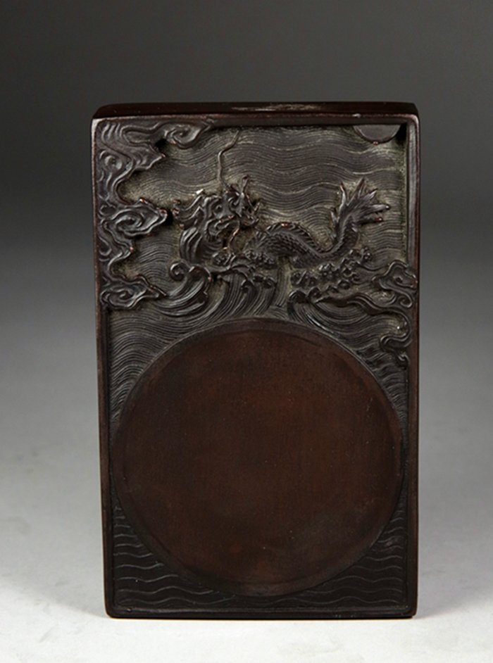 A INKSTONE PAD CARVED DRAGON SEALED WITH ZHU YI ZUN: A Inkstone Pad Carved Dragon Sealed with Zhu Yi Zun Mark 朱彝尊款龙纹砚台 L:15.8cm; W: 7.3cm; H: 2.5cm