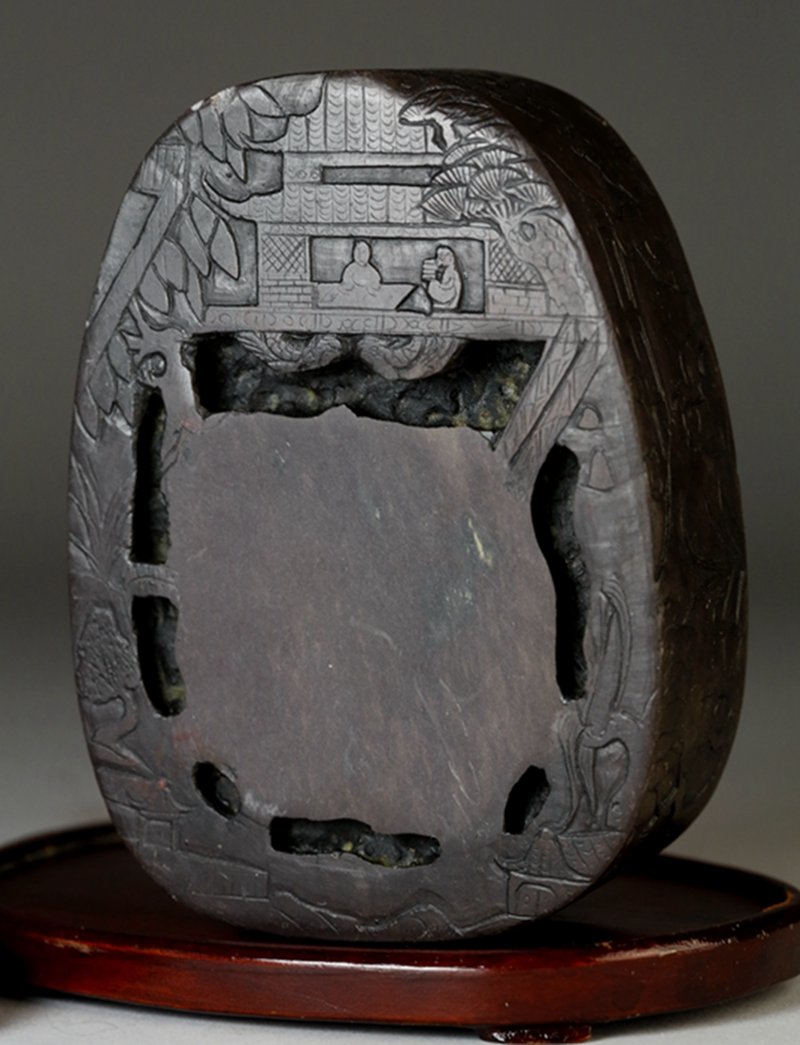 A CHINESE INKSTONE: Qing period. Inscribed orchhid pavilion duan inkstone. 清代兰亭图紫端砚台 W: 11.8X8.8cm; H: 3.8cm.