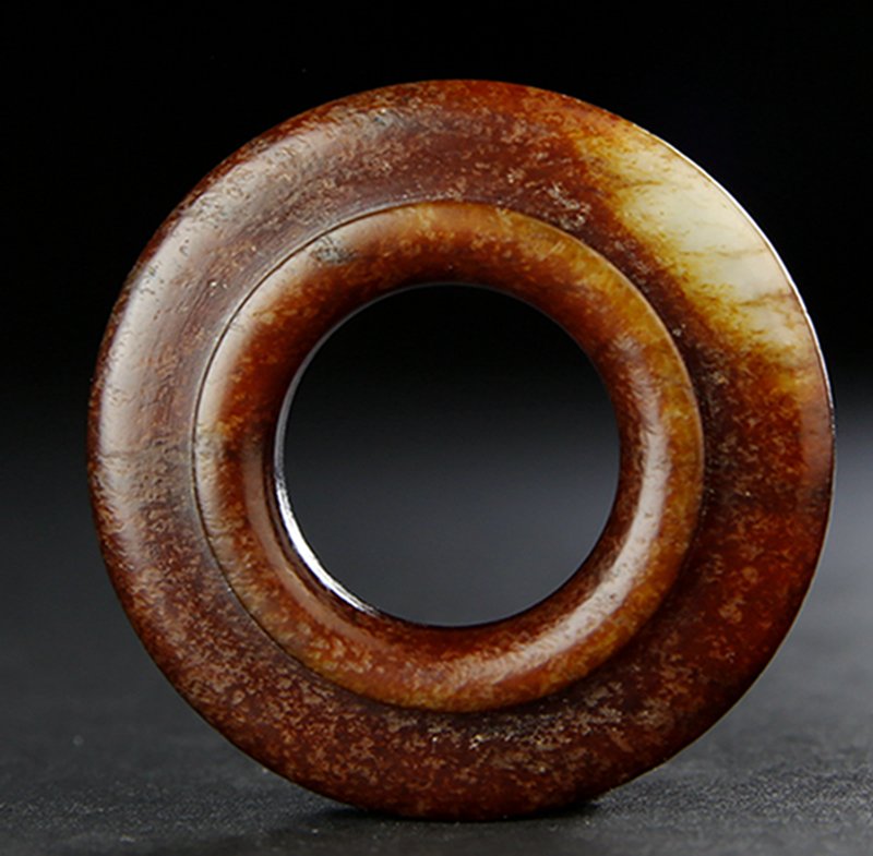 A INNER BULGED BROWN JADE HUAN DISC (1 of 4)