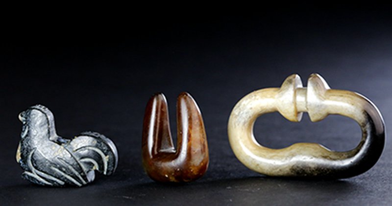 A SET OF THREE SMALL AND DIFFERENT TYPES OF JADE (1 of 4)