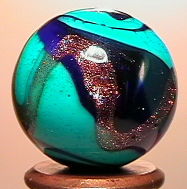 65130 BB Marbles: Michael O'Donnell Swirl: CONTEMPORARY HANDMADE, Michael O'Donnell. Swirled opaque light blue, transparent light blue and lutz. Beautiful. Signed "MRO 02". 3/4". Mint (9.9).