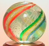 69248 BB Marbles: Latticino Core Swirl: SWIRL, Latticinio core. White latticinio core. Outer layer is three bands. Each is white strands, flanked by yellow, flanked by a color. One light blue, one light red, one green. Germany, circa 1870-1