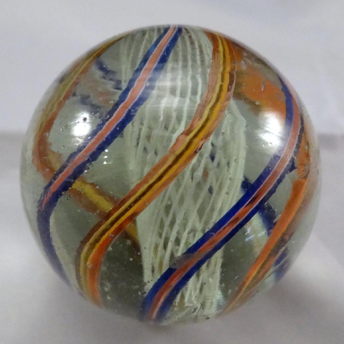 . SWIRL, Latticinio Core. 1-31/32". 9.7: Lot 99. SWIRL, Latticinio Core. White Latticinio Core Swirl. In great shape. Germany, circa 1860-1920. 1-31/32". Mint (9.7). Estimate $450-$900