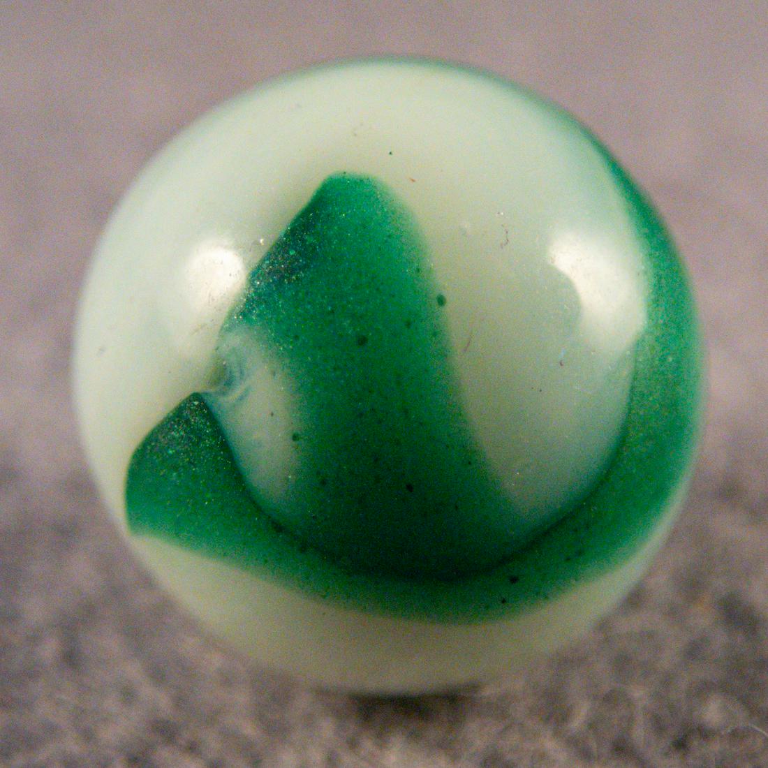Marbles. ALLEY AGATE COMPANY, Swirl. 21/32". Near Mint (8.6).: ALLEY AGATE COMPANY, Swirl. Shimmering Spruce. Aventurine green swirls in opaque white. Fiery aventurine. A couple small chips. Pennsboro WV, circa 1931-1937. 21/32". Near Mint (8.6).