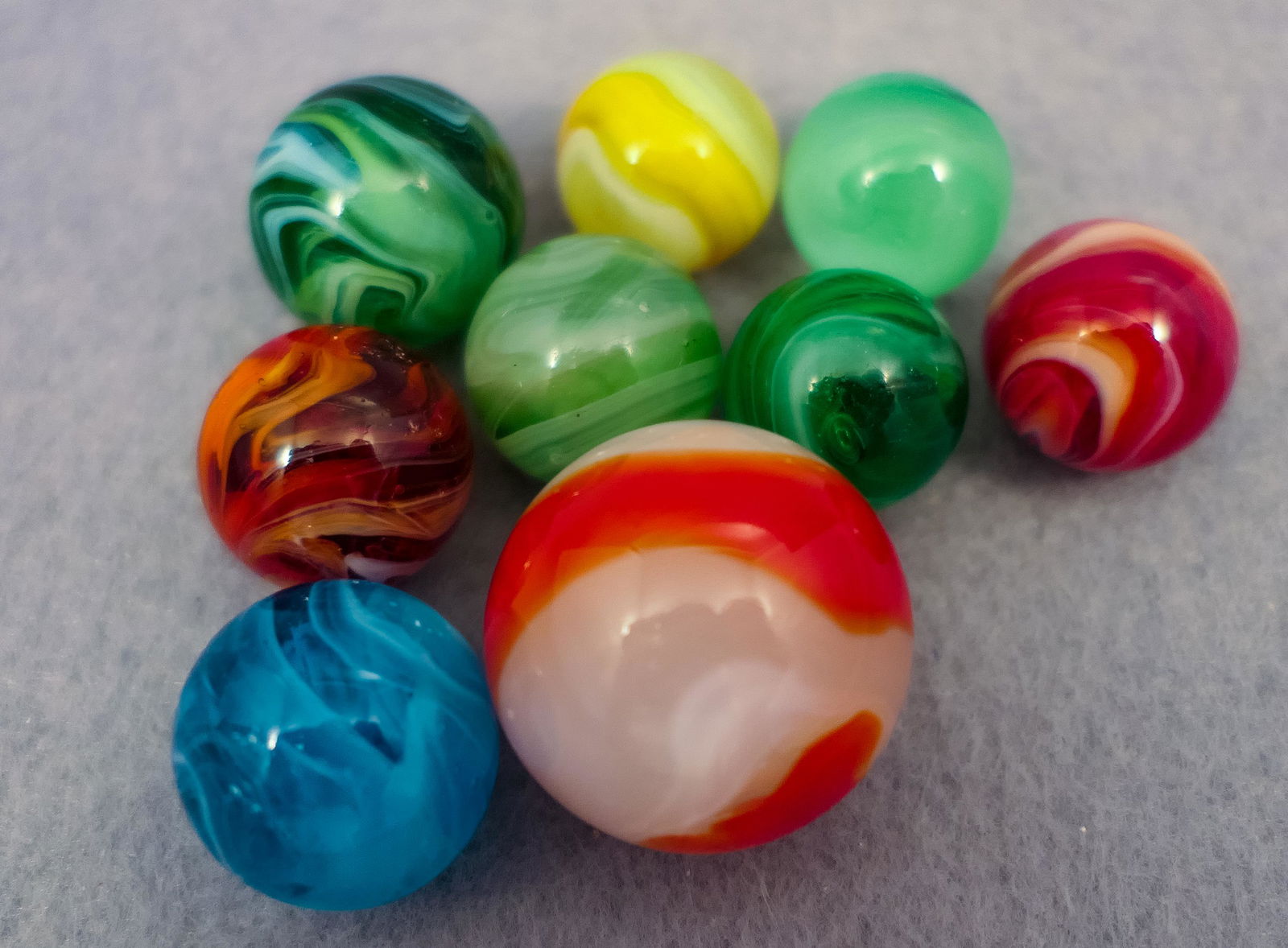 Marbles: AKRO AGATE COMPANY, Assorted. 9 marbles. (1 of 3)