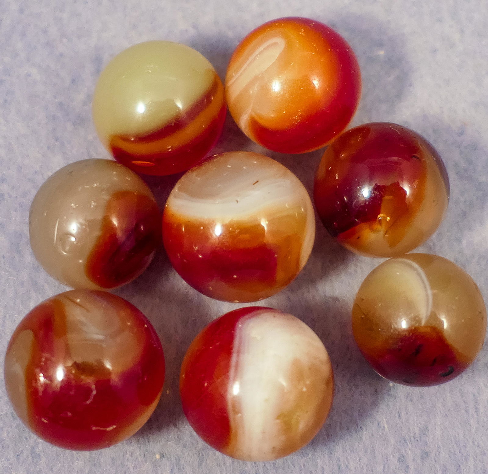 Marbles: AKRO AGATE COMPANY, Carnelian. 8 marbles. (1 of 3)