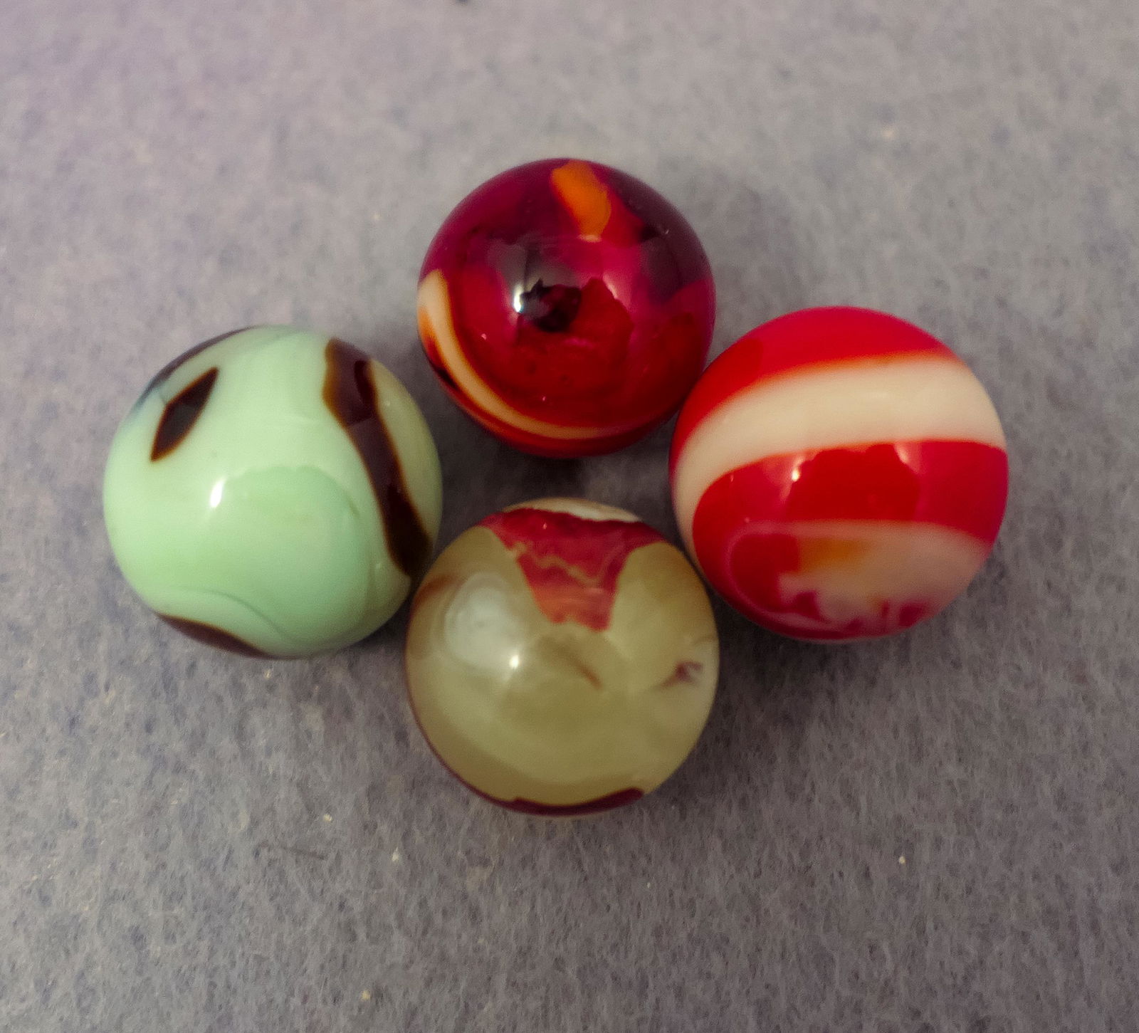 Marbles: ASSORTED MACHINE MADE. 4 marbles. (1 of 3)