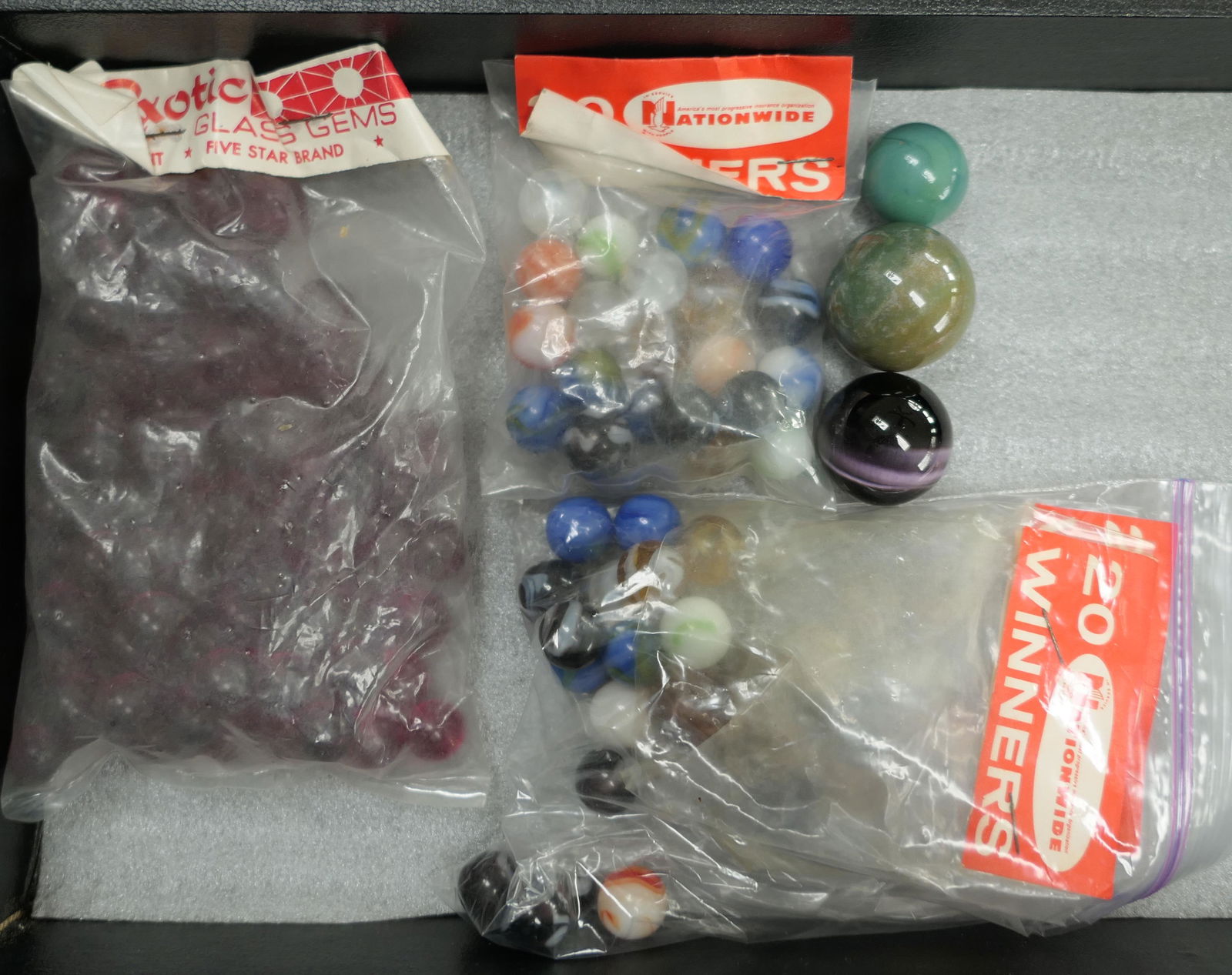 Marbles: ASSORTED MACHINE MADE. 3 marbles & 4 packages. (1 of 4)