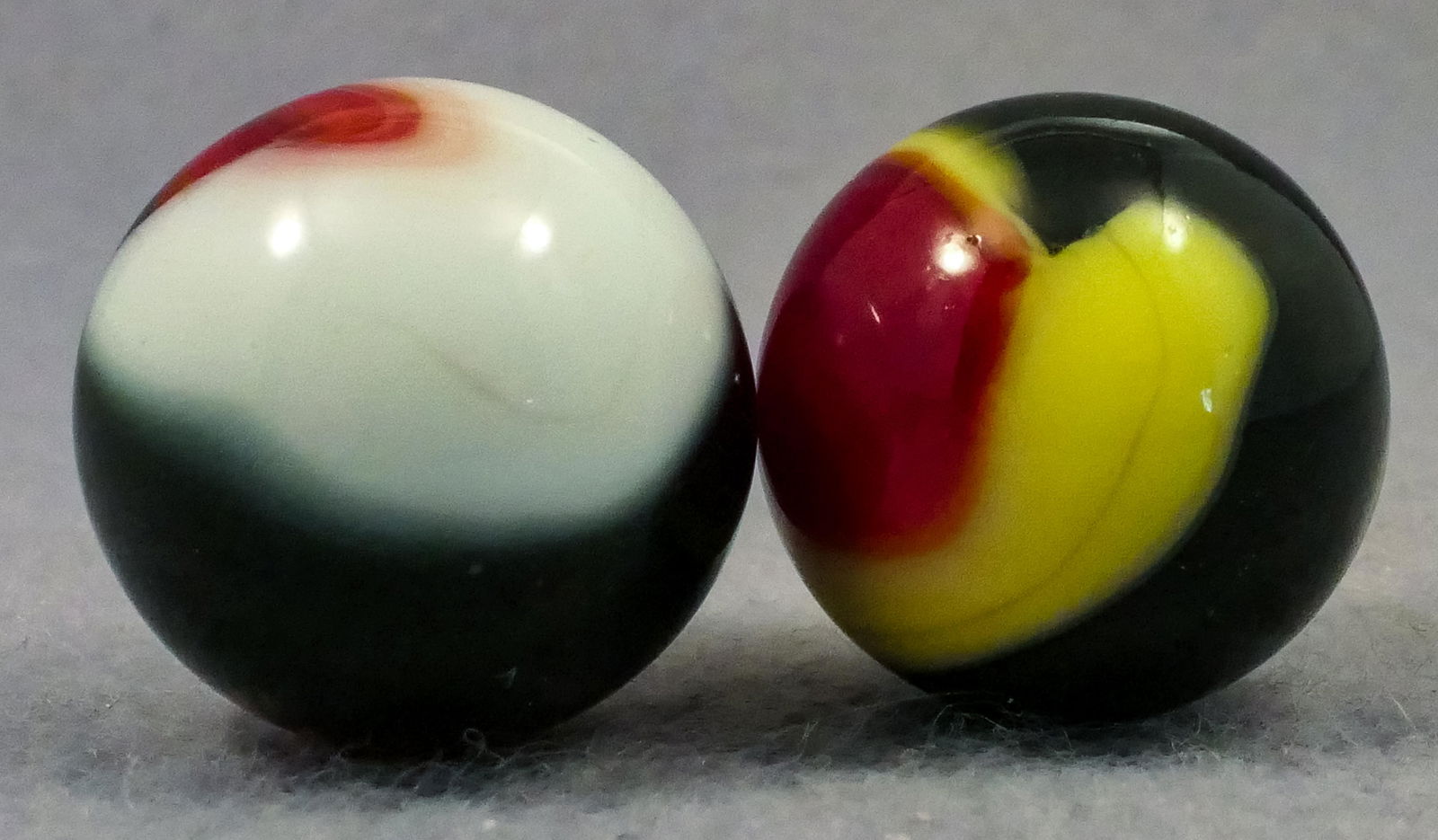 Marbles: AKRO AGATE COMPANY, Corkscrew. 2 marbles. (1 of 4)