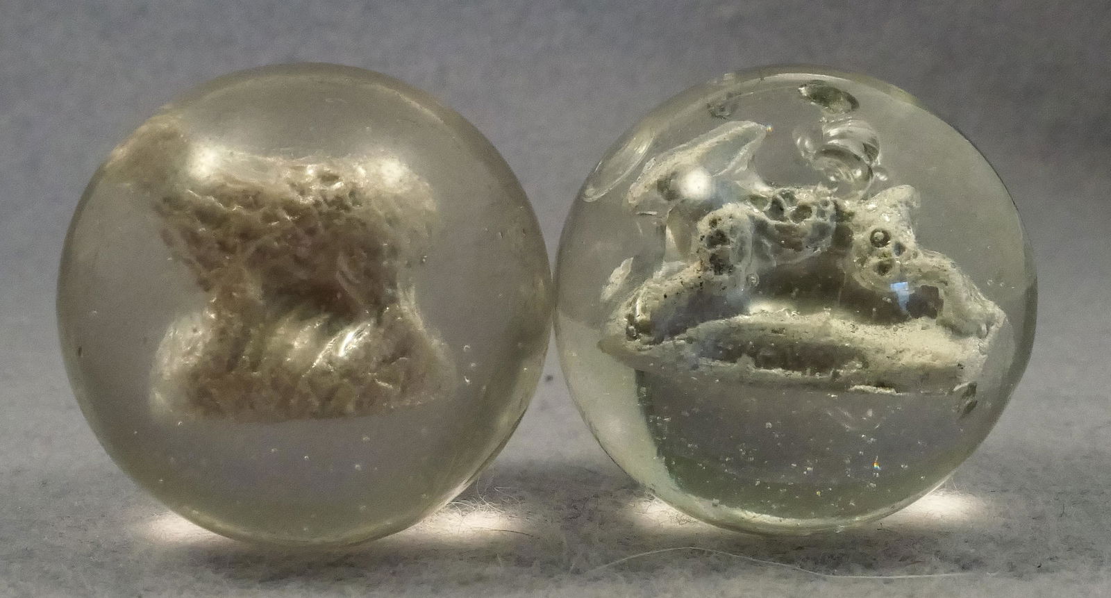 Marbles: SULPHIDE. 2 marbles. Rabbit, Bear. (1 of 2)