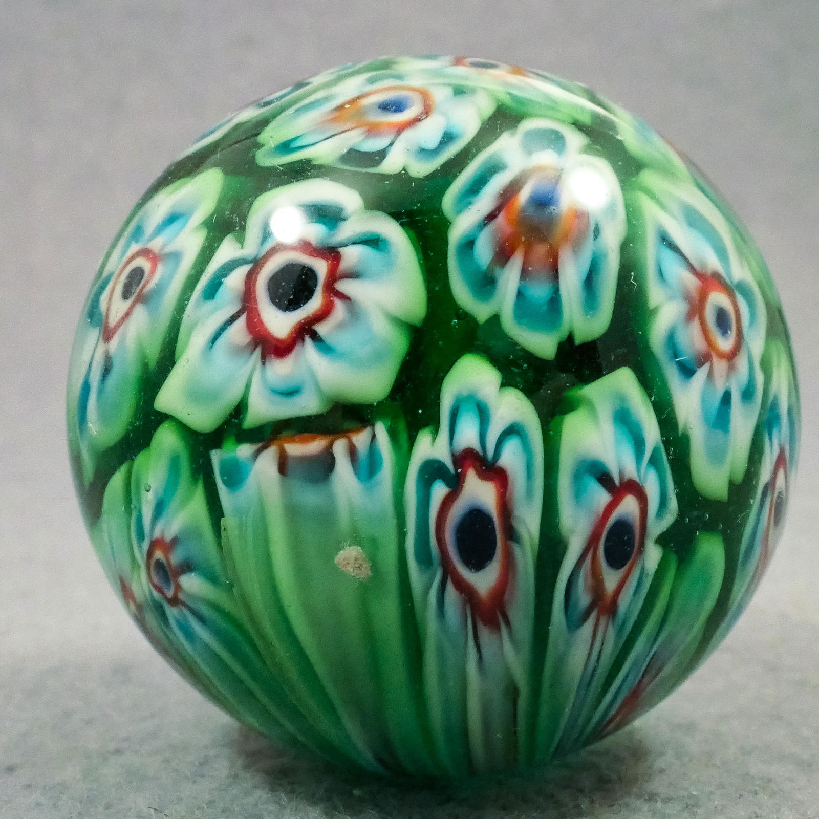 Marbles: CONTEMPORARY HANDMADE. 1-9/16". Mint (9.9).: CONTEMPORARY HANDMADE. Interesting. Subsurface layer is packed millefiori murrini canes. Signed "JC 2012".1-9/16". Mint (9.9).