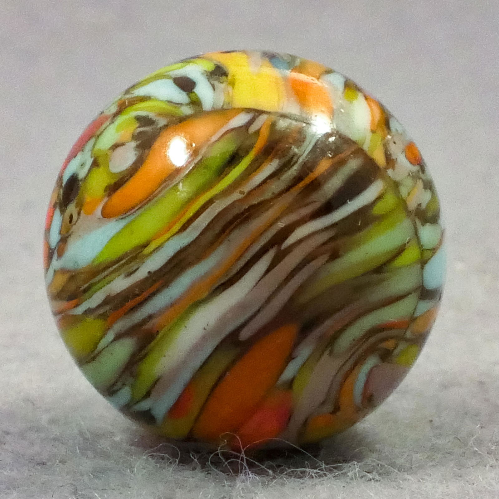 Marbles: CHRISTENSEN AGATE COMPANY, Guinea. 11/16". Mint (9.9). (1 of 6)