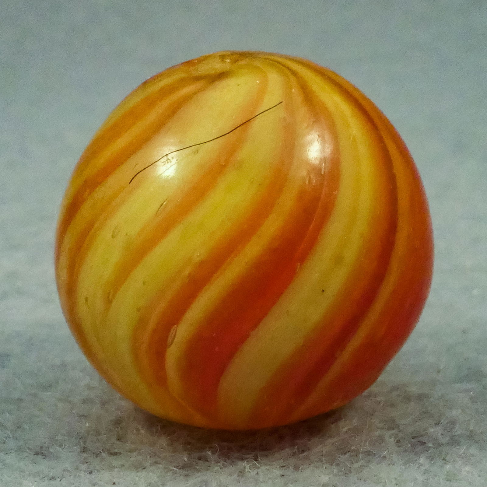 Marbles: END OF DAY, Onionskin. 11/16". Mint (9.9).: END OF DAY, Onionskin. Core is opaque yellow with stretched transparent pink on it. In great shape. Germany, circa 1860-1920. Provenance: ex-collection Rev. Ann Thacker. 11/16". Mint (9.9).