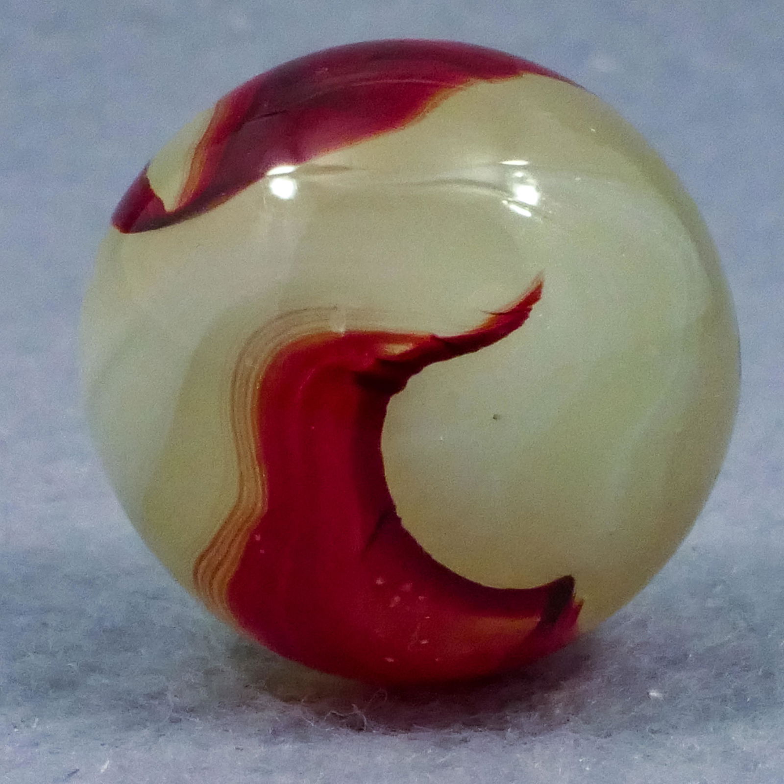 Marbles: AKRO AGATE COMPANY, Lemonade Oxblood. 23/32". Mint (9.9). (1 of 7)