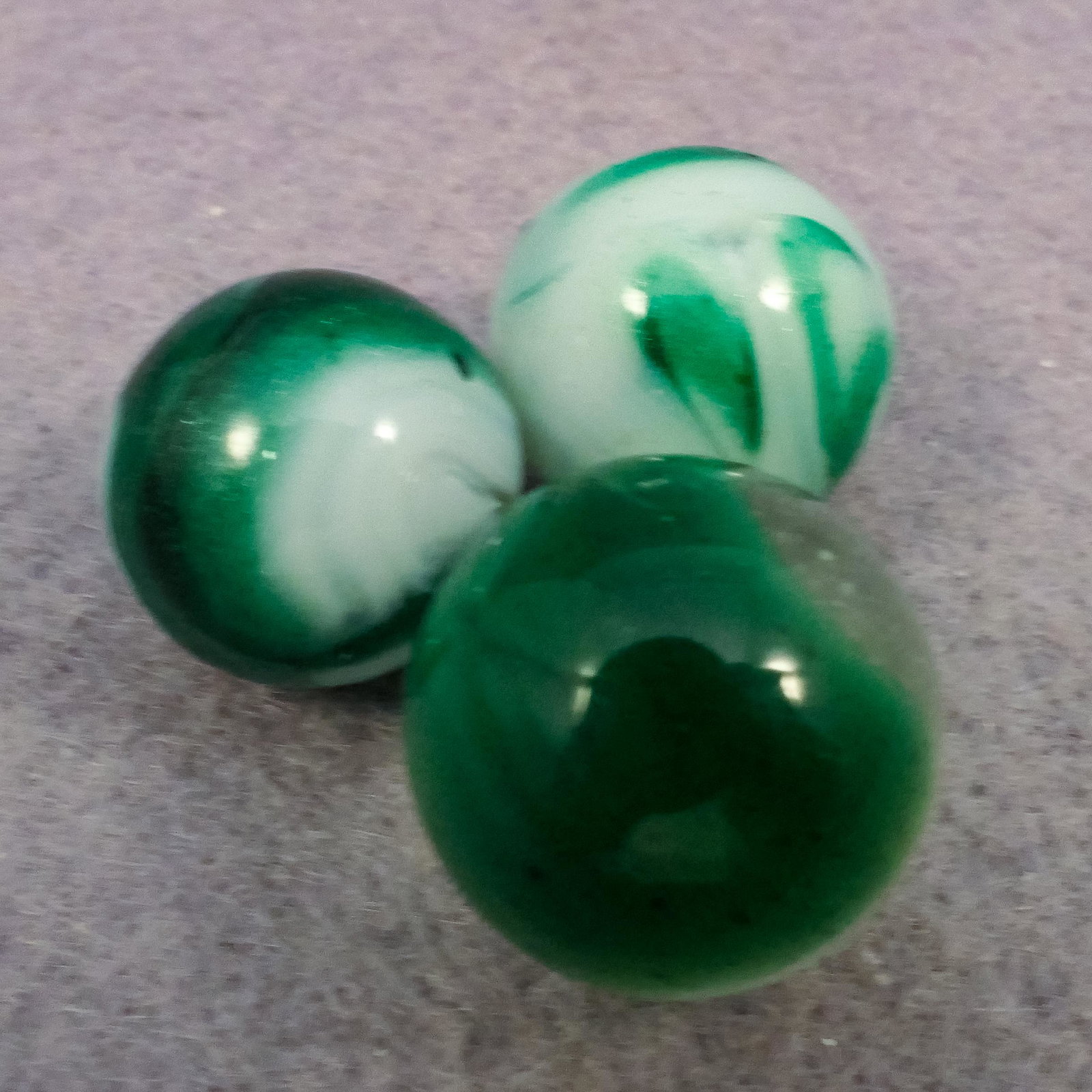 Marbles: ASSORTED MACHINE MADE. 3 Aventurine marbles. (1 of 4)
