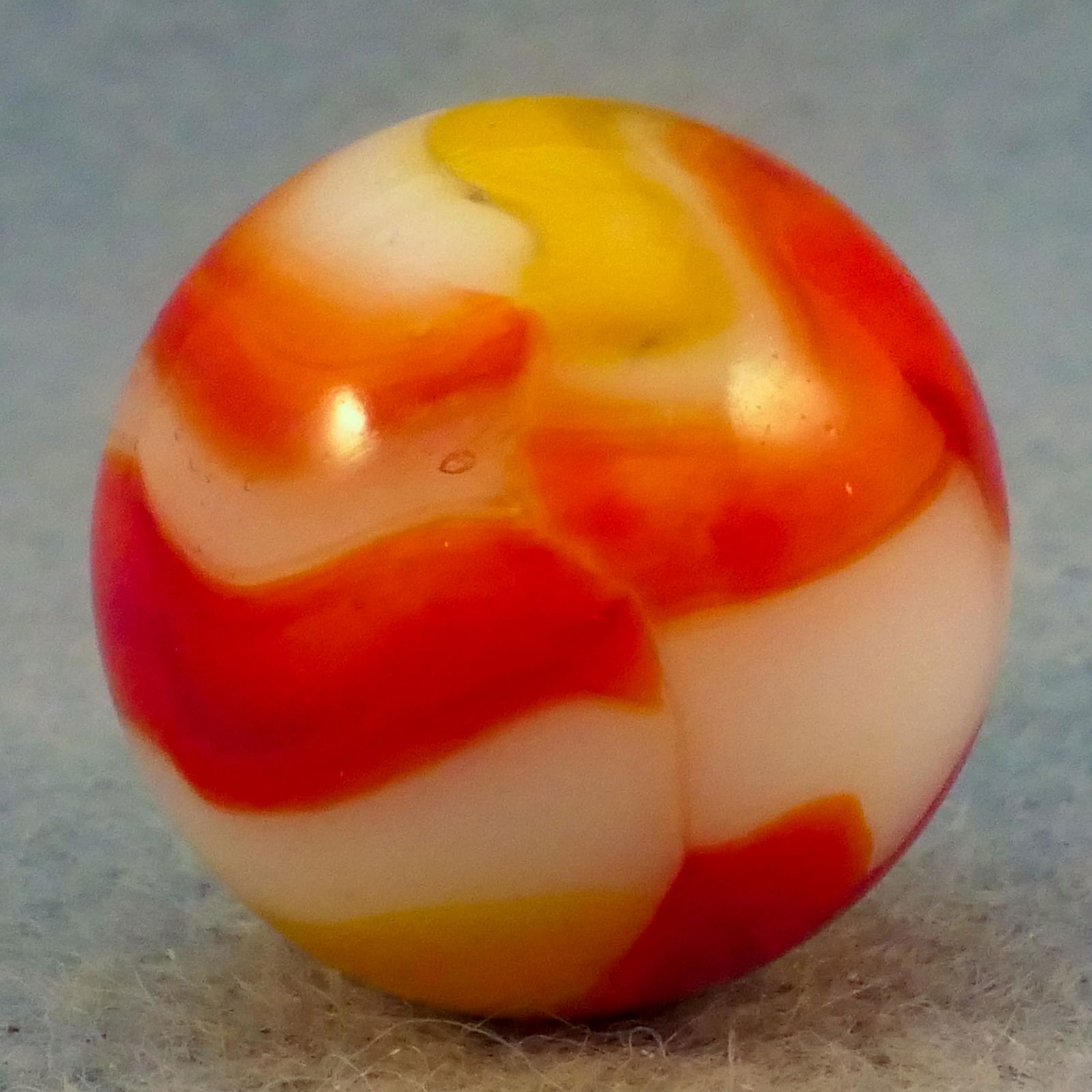 Marbles: PELTIER GLASS COMPANY, Ketchup & Mustard. 21/32". Mint (9.8).: PELTIER GLASS COMPANY, National Line Rainbo. Six-ribbon three-color National Line Rainbo Ketchup and Mustard. Four red ribbons and two yellow ribbons in opaque white base. Two tiny airholes. Ottawa IL