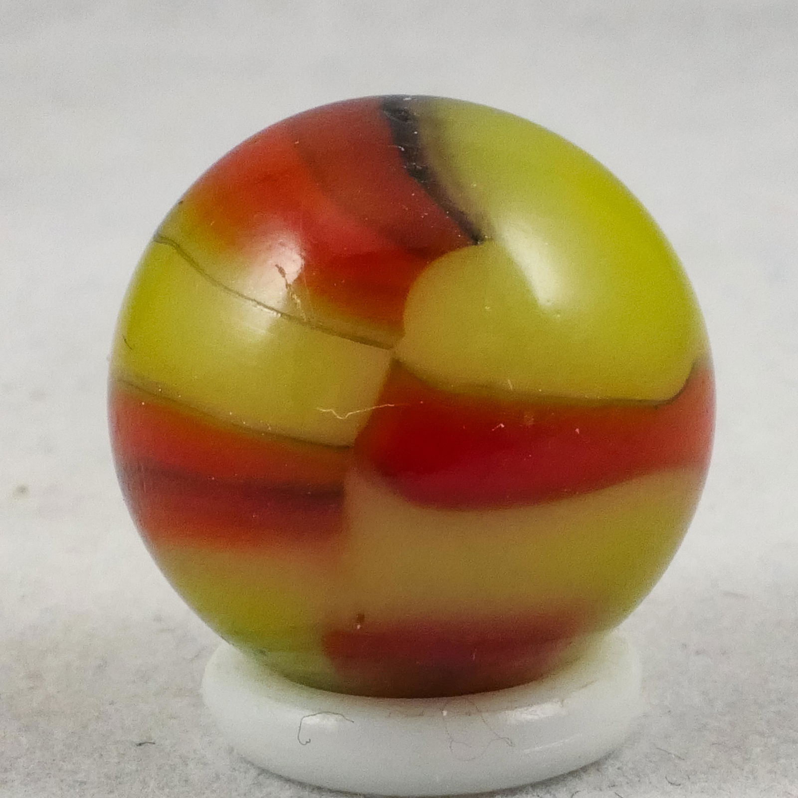 Marbles: PELTIER GLASS COMPANY, Golden Rebel. 21/32". Mint (9.9). (1 of 6)
