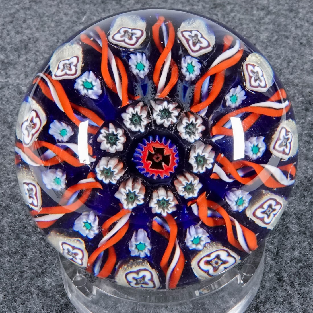 PAPERWEIGHT, Strathearn Glass. General Line.: PAPERWEIGHT, Strathearn Glass. 11-spoke radial with 1-1 pattern. Has paper label on base. Scotland, circa 1970-1990. Width: 2-3/8". Height: 1-7/8". Mint.
