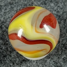 AKRO AGATE COMPANY, Egg Yolk Oxblood. 5/8". Near Mint (8.6).