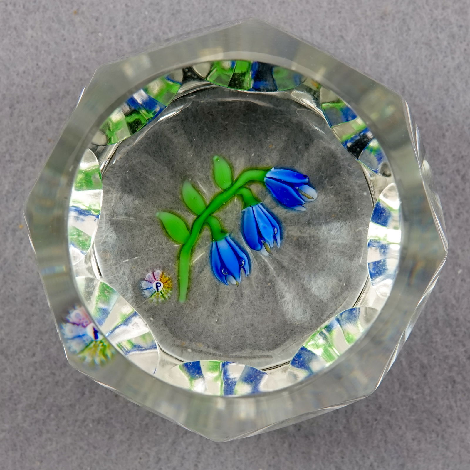 PAPERWEIGHT, Perthshire Paperweights. PP1978C: PAPERWEIGHT, Perthshire Paperweights. Perthshire 1978C Limited Edition paperweight. Scottish Bluebells. Flowers with a "P" signature cane. Viewing window on top. Eight viewing windows around the weigh
