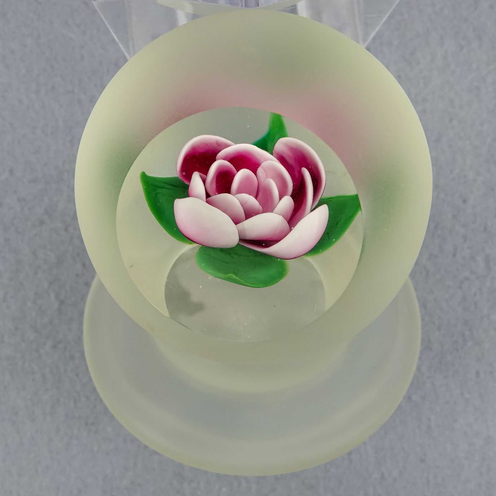 PAPERWEIGHT, Robert Grablow.: PAPERWEIGHT, Robert Grablow. Millville Crimp Rose pedestal weight. Nice viewing window, remainder is ground matte finish. Signed on bottom "R Grablow 1991". 3" width, 1-3/4" height. Mint.