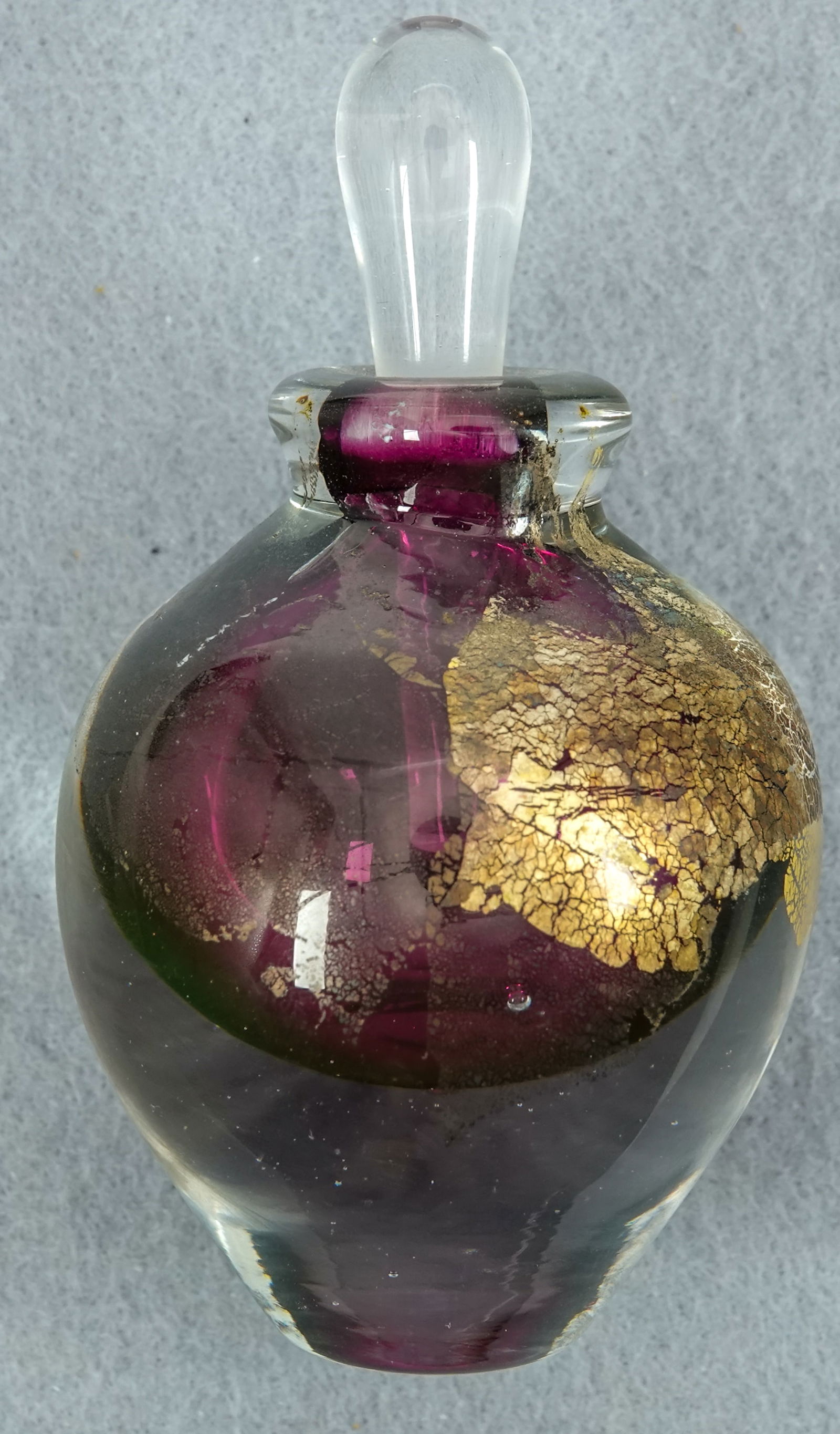 PAPERWEIGHT. Scent Bottle. Illegible signature.: PAPERWEIGHT. Nice glass scent bottle with illegible signature on the bottom. First name appears to be Kevin. 2" width, 3-1/2" height.